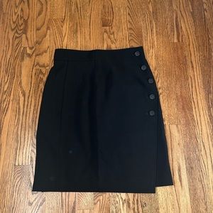 Akris black tropical wool skirt below the knee